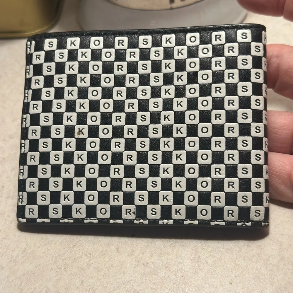 Michael Kors Cooper bilfold bifold wallet. Black and white. Used, mild wear